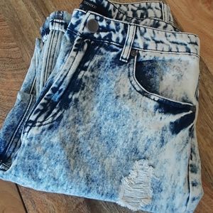 Acid wash ripped jeans